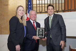 (L-R) Katherine Peters, Director of Residential Energy Efficiency at Eversource, Rep Roy and Chris Porter from National Grid, Director of Customer Energy Management at National Grid
